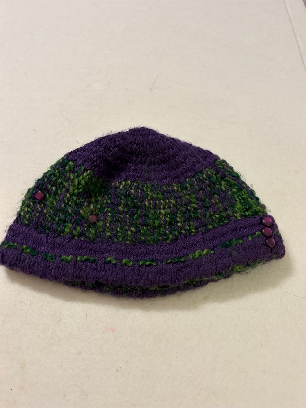 Handmade hat, greens and purples
